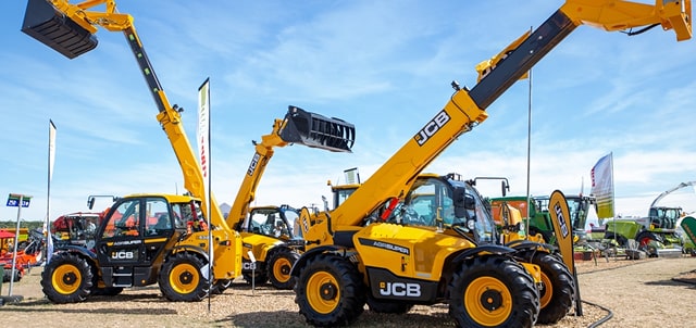 Yellow JCB telehandlers displayed outdoors.